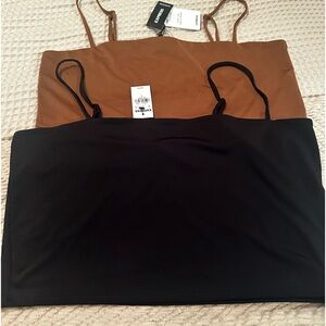 2 Express body contour tops size Large. Silk like material. Very soft.